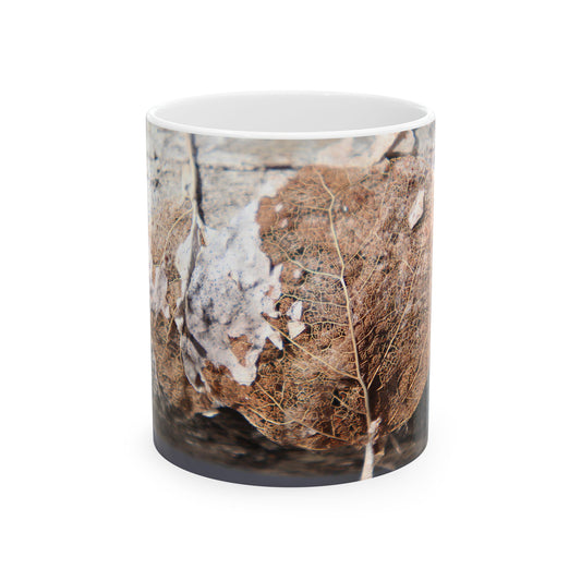 Ceramic mug with macro photo of detailed dried leaf veins and natural textures