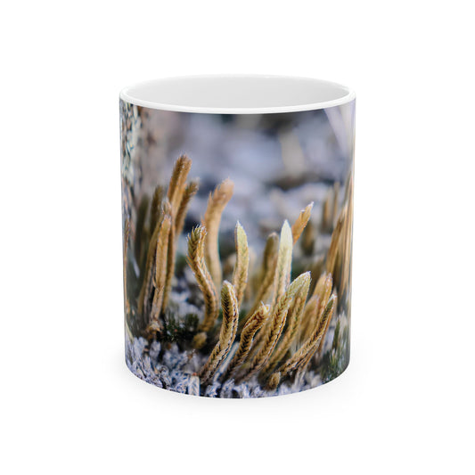 White mug featuring macro photo of lichen or moss in natural outdoor setting